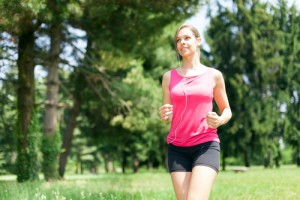 Young woman running outdoors