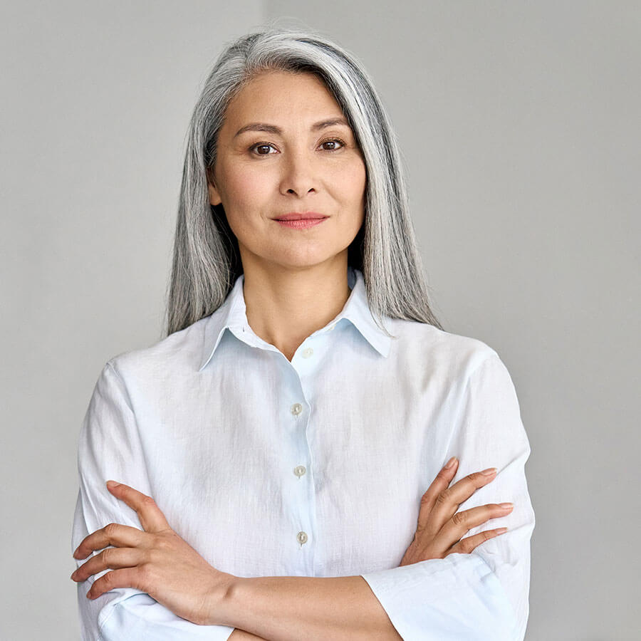 Middle aged woman crossing her arms