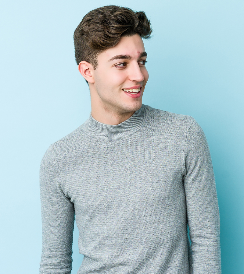 young adult male model in turtle neck