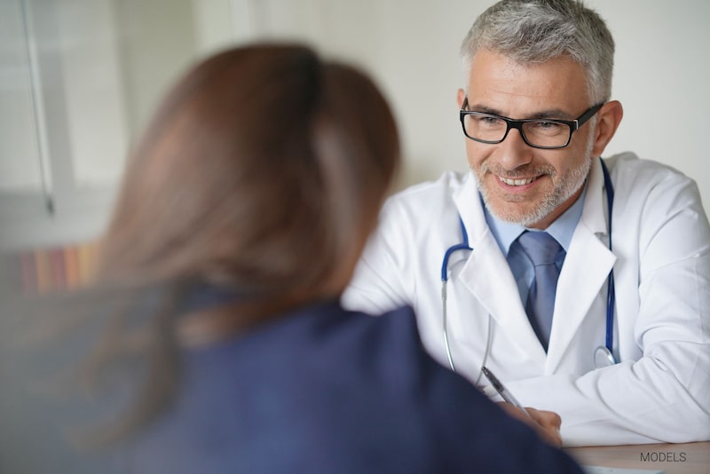 Woman consulting her doctor.